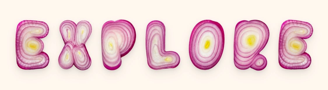 the letters of the word 'explore' look like sliced red onions
