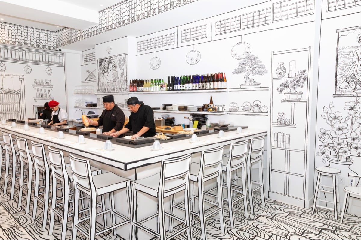 the interior of a restaurant where everything is painted to look like a black & white drawing