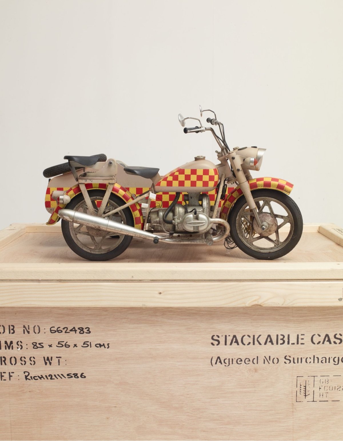 a miniature model of a motorcylce with a sidecar