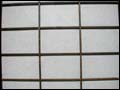 a geometric pattern in the window of a japanese restaurant