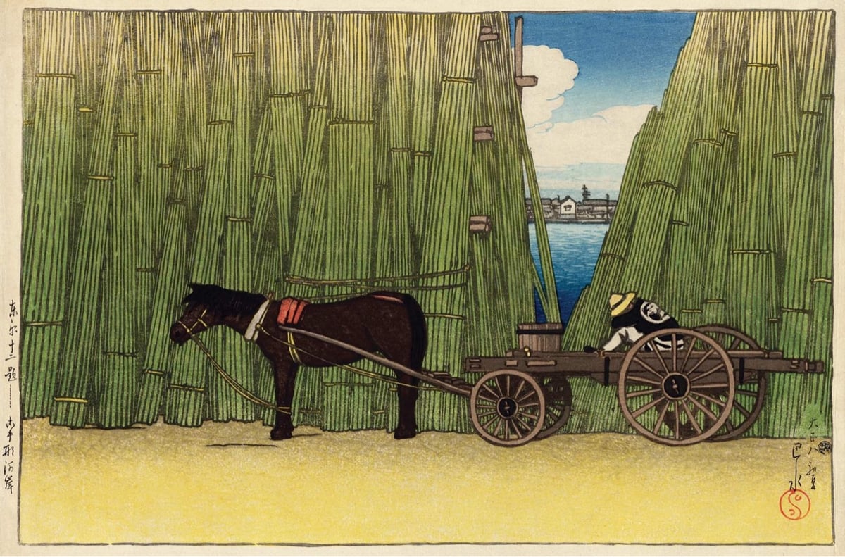 woodblock print of a horse-drawn wagon in front of bundles of bamboo