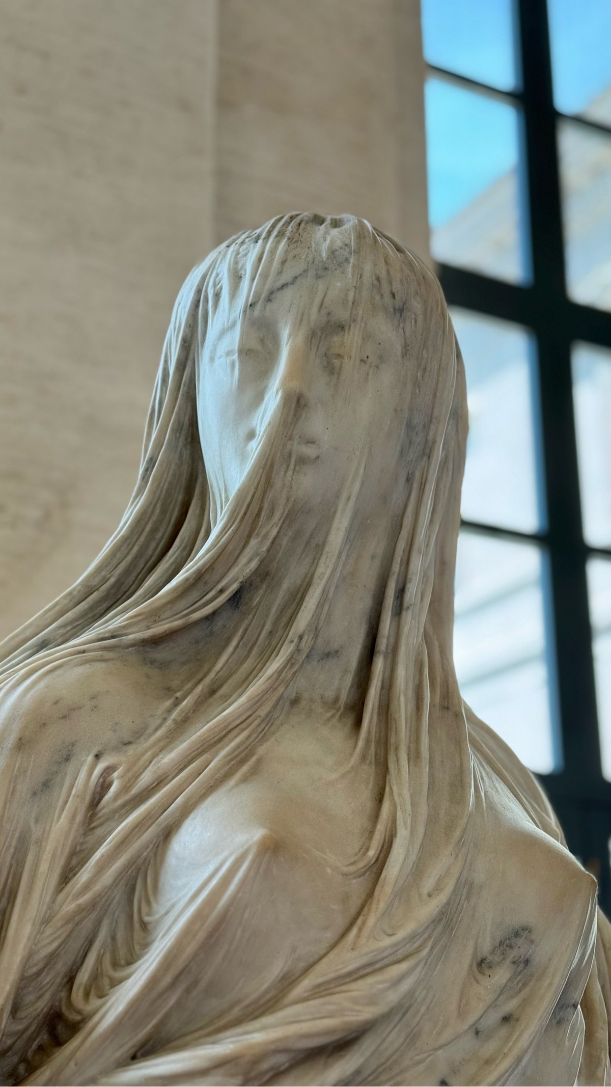 statue of a veiled woman