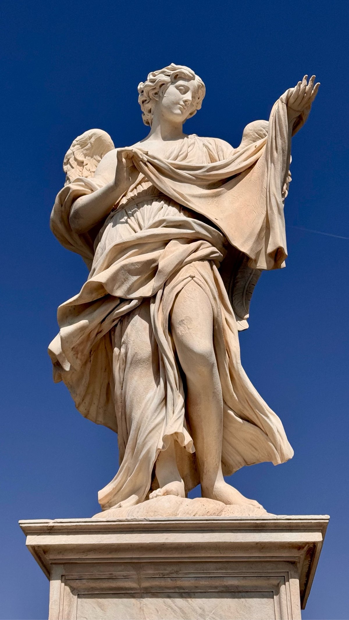 a statue of an angelic woman