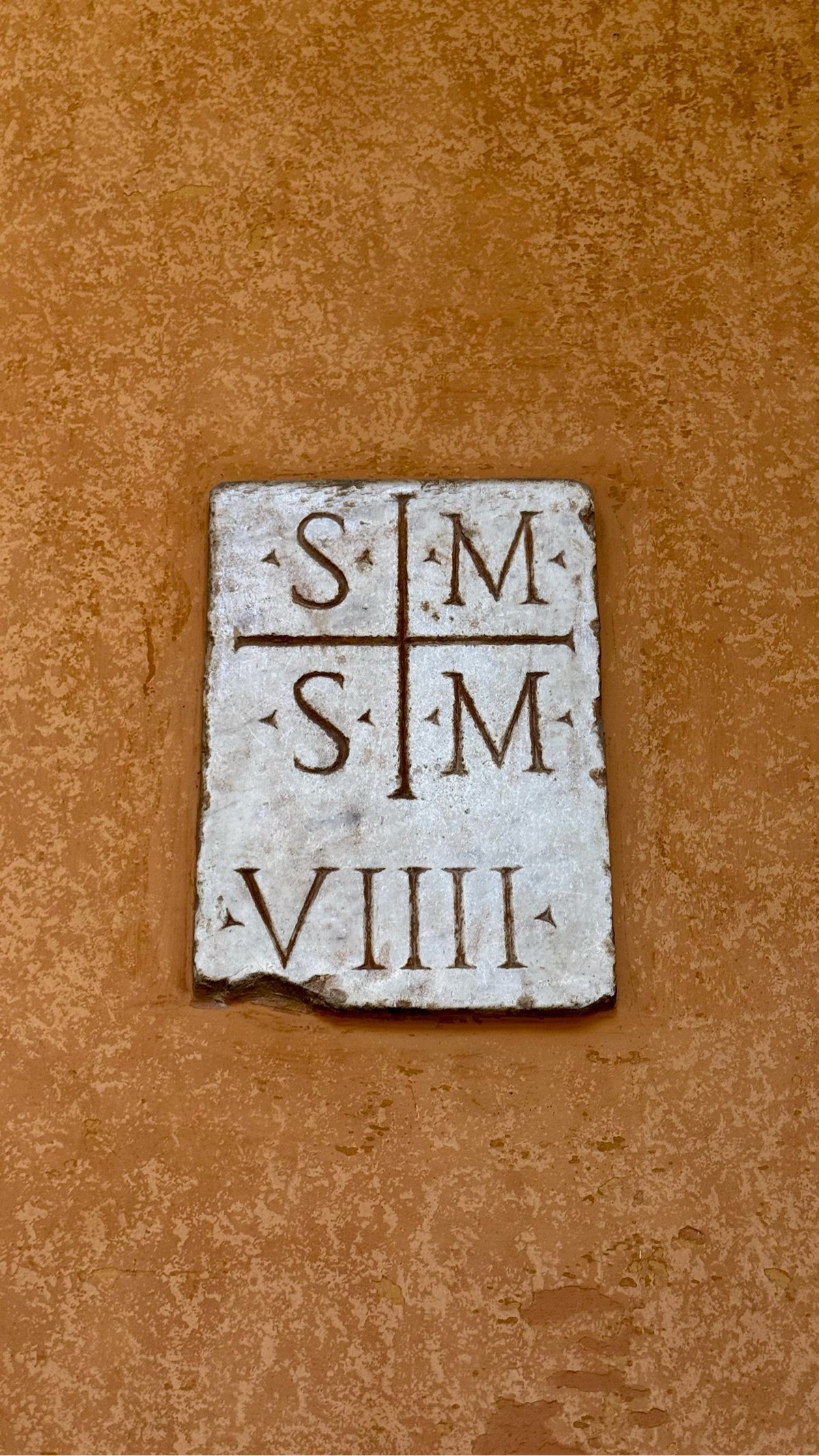 detail of letters carved into stone