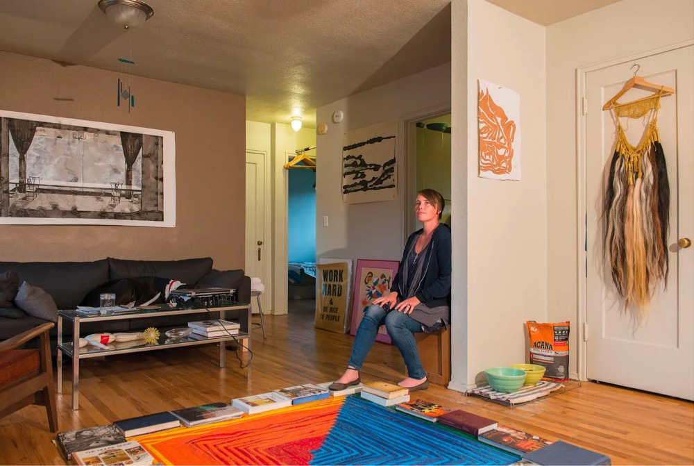 a woman sitting in her living room