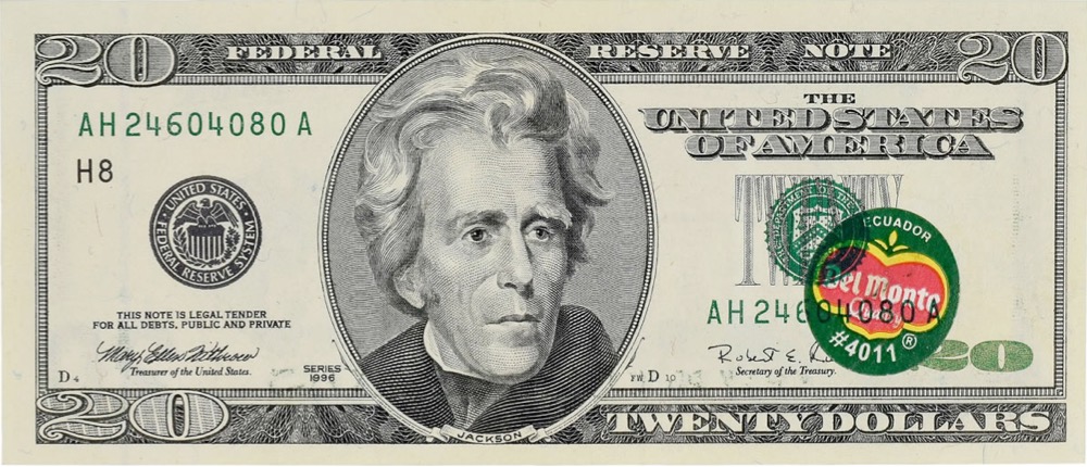 A misprinted $20 bill with a Del Monte banana sticker on it