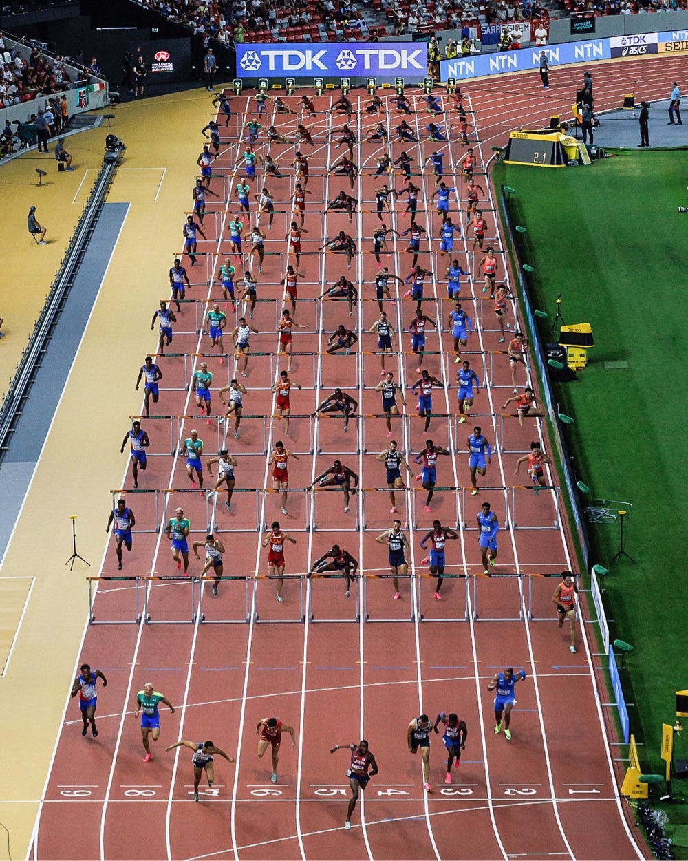 a composite image of a 110-meter hurdles race at the 2023 world championships